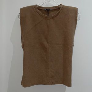 Shoulder pad sweater tee